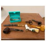 Lot of vintage pipes and razors including a 1955 Missouri Lions Corncob Pipe