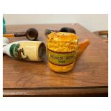 Lot of vintage pipes and razors including a 1955 Missouri Lions Corncob Pipe