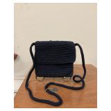 Navy blue Sak brand purse.