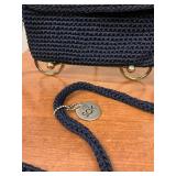 Navy blue Sak brand purse.