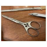Vintage lot of scissors, letter opener and magnifying glass