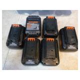 Tote of Black & Decker Batteries and Chargers
