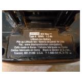 Tote of Black & Decker Batteries and Chargers
