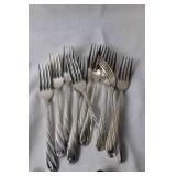 Set of 41 Mixed Silver Flatware Pieces Including Forks, Knives, and Spoons