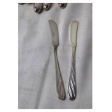 Set of 41 Mixed Silver Flatware Pieces Including Forks, Knives, and Spoons