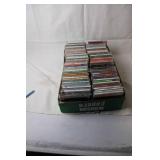 Large Collection of Various Music CDs Including Elvis, Dolly Parton, and More