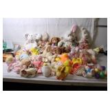 Collection of Plush Bunnies and Ducks with Decorative Eggs