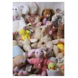 Collection of Plush Bunnies and Ducks with Decorative Eggs