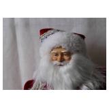 Vintage Santa Claus Figurine with Plush Coat and Gift Bag