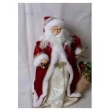Vintage Santa Claus Figurine with Plush Coat and Gift Bag