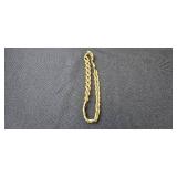 Set of Gold-Tone Jewelry Pieces: Necklace, Bracelet, and Chain - display not inc