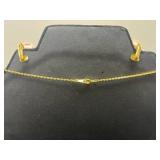 Elegant Gold-Toned Necklace and Earring Set with Rose Detailing - display not inc