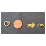 Collection of Vintage Brooches and Pins with Various Designs