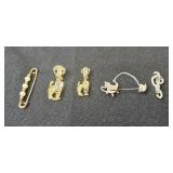 Collection of Vintage Brooches and Pins with Various Designs