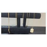 Collection of Gold-Tone Finish Necklaces with Various Pendants - display not inc