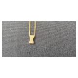 Collection of Gold-Tone Finish Necklaces with Various Pendants - display not inc