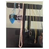 Assorted Lot of Necklaces, Brooches, and Earrings - display not inc