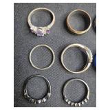 Jewelry Collection: Earrings, Sterling Silver Studs, Skull Earrings, and Assorted Rings