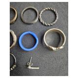 Jewelry Collection: Earrings, Sterling Silver Studs, Skull Earrings, and Assorted Rings