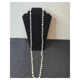 Collection of Gold Tone and Faux Pearl Necklaces with Tassel Accents - display not inc