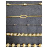 Collection of Avon Gold Tone and Faux Pearl Bracelets