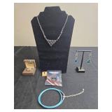 Set of Jewelry and Collectibles Including Necklaces, Earrings, and Collector Pins - Display not Inc