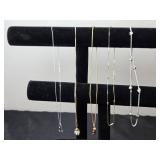 Collection of Elegant Necklaces: Heart Pendant, Pearl Like Cage, and Beaded Designs - display not inc