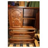Vintage Wooden Cabinet with Intricate Carvings and Storage