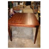 Wooden Dining Table with Leaf Design Accents