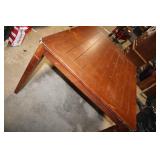 Wooden Dining Table with Leaf Design Accents