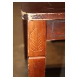 Wooden Dining Table with Leaf Design Accents