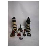 Collection of 8 Decorative Lighthouse Figurines with Varied Designs