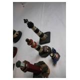 Collection of 8 Decorative Lighthouse Figurines with Varied Designs