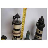 Collection of 8 Decorative Lighthouse Figurines with Varied Designs