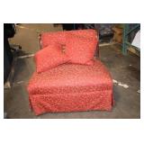 Antique Red Upholstered Chair with Ornate Wooden Frame and Cushions