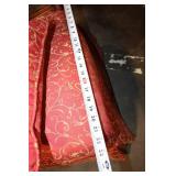 Antique Red Upholstered Chair with Ornate Wooden Frame and Cushions