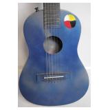Blue Acoustic Guitar with Native American Symbol