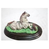 Set of Zebra Figurines, Brass Swan, and Blue Storage Box