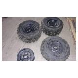 3 tires 4 rims look to be off a sid...