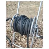 Roll up Garden Hose Reel Cart with Wheels and Black Hose