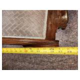 Cool ornate antique Chair with front side wheels and great detail