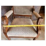 Cool ornate antique Chair with front side wheels and great detail