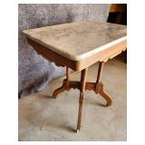 Solid Beautiful side table with great detail and marble top