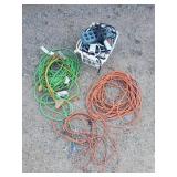 Extension Cords and A Basket of power strips with Basket