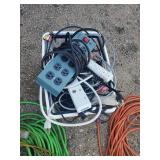 Extension Cords and A Basket of power strips with Basket