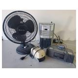 Electronic Lot With a Comfort Zone Fan, Vintage Boston Pencil sharpener, I Home Sound System, and Small room Size Humidifier
