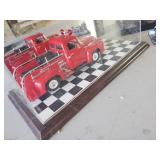 Framed Miles Ahead Mobil Gas Advertising, Fire Truck in Case, Wooden hand Carved Car in Case, and Rusty #2 Race Car