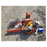 Two Husqvarna Gas powered Chain saws and Misc Accessories one works as it should the other is for Parts or Repair