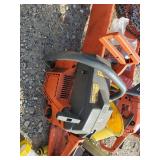 Two Husqvarna Gas powered Chain saws and Misc Accessories one works as it should the other is for Parts or Repair