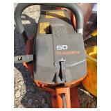 Two Husqvarna Gas powered Chain saws and Misc Accessories one works as it should the other is for Parts or Repair